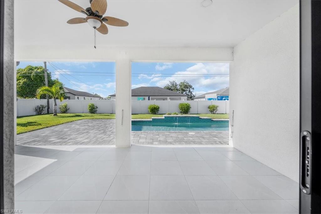 View of pool with a patio area and a fenced backyard