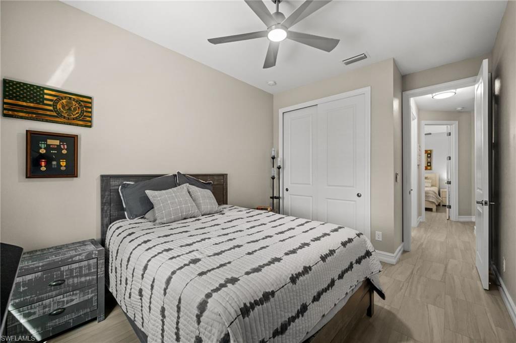 Bedroom featuring a closet and ceiling fan