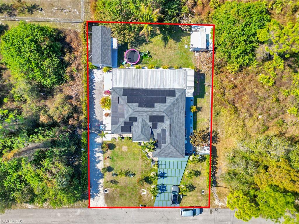 Aerial overview of property's location featuring property boundaries highlighted