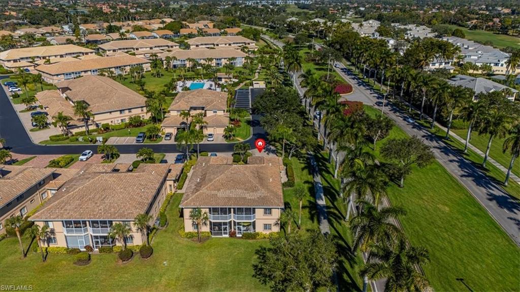 View of property location with nearby suburban area