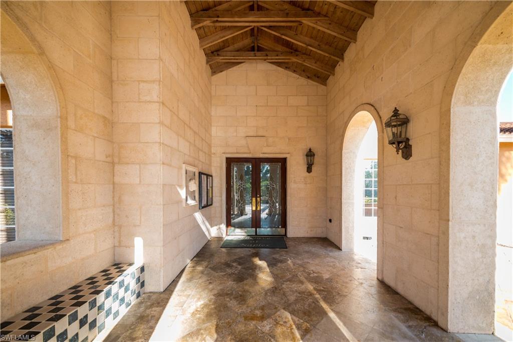 Doorway to property featuring french doors