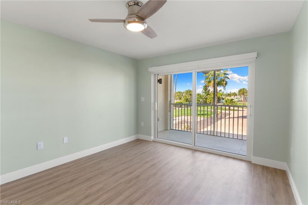 Bedroom with wood finished floors and ceiling fan