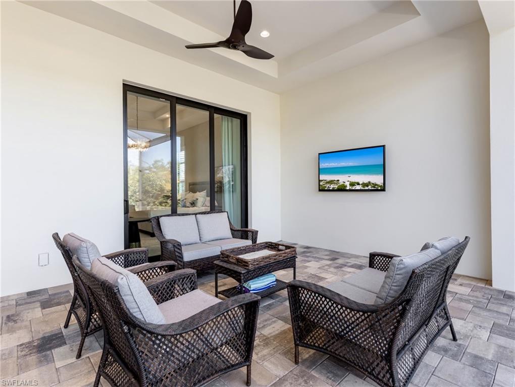 View of patio / terrace with outdoor lounge area and ceiling fan