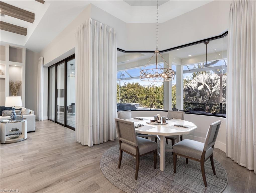 Dining space with light wood-type flooring