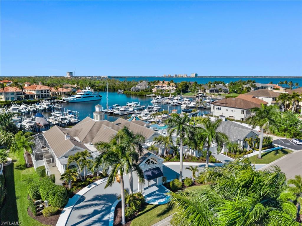 Bird's eye view of a marina and a nearby body of water