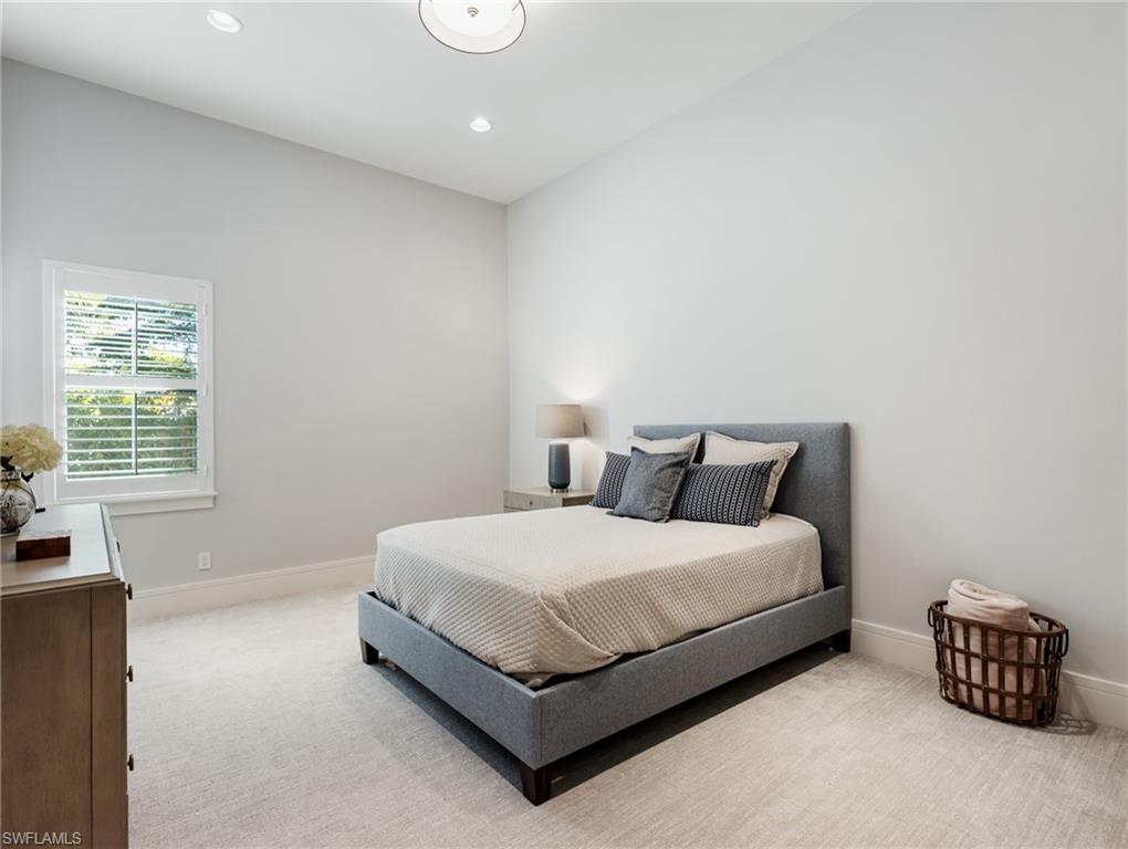 Bedroom with carpet and recessed lighting