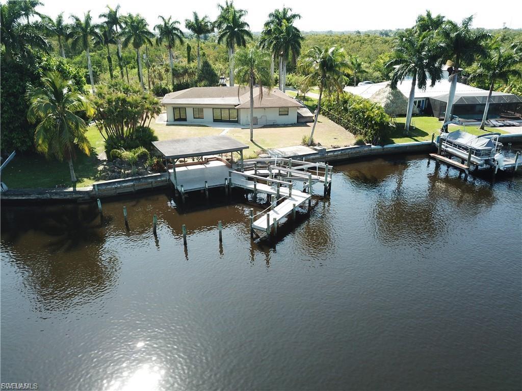 Dock with boat lift and a water view