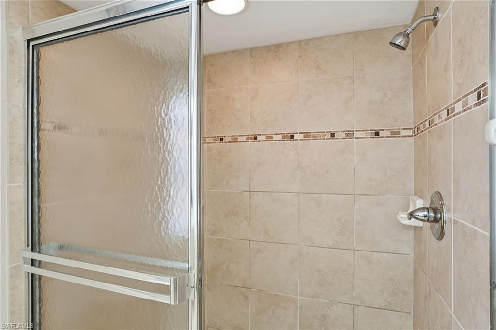 Bathroom featuring a shower stall