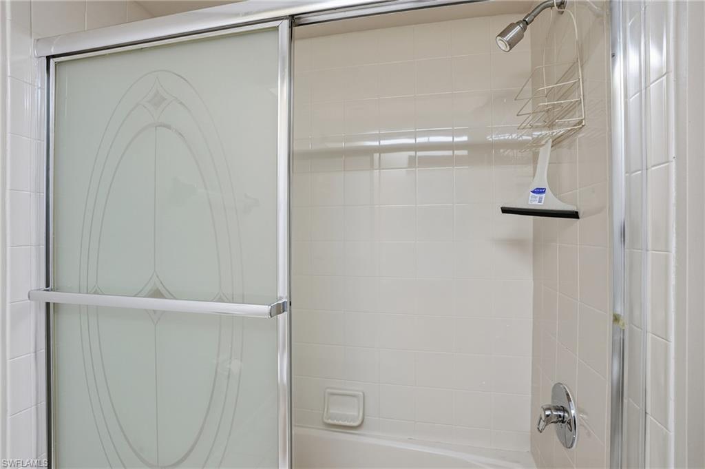 Full bath with enclosed tub / shower combo
