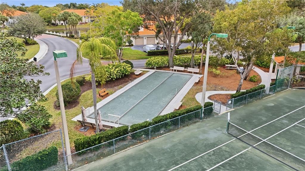 View of property's community featuring a bocce ball area and tennis courts