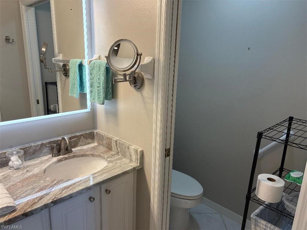 Toilet closet and granite counters.