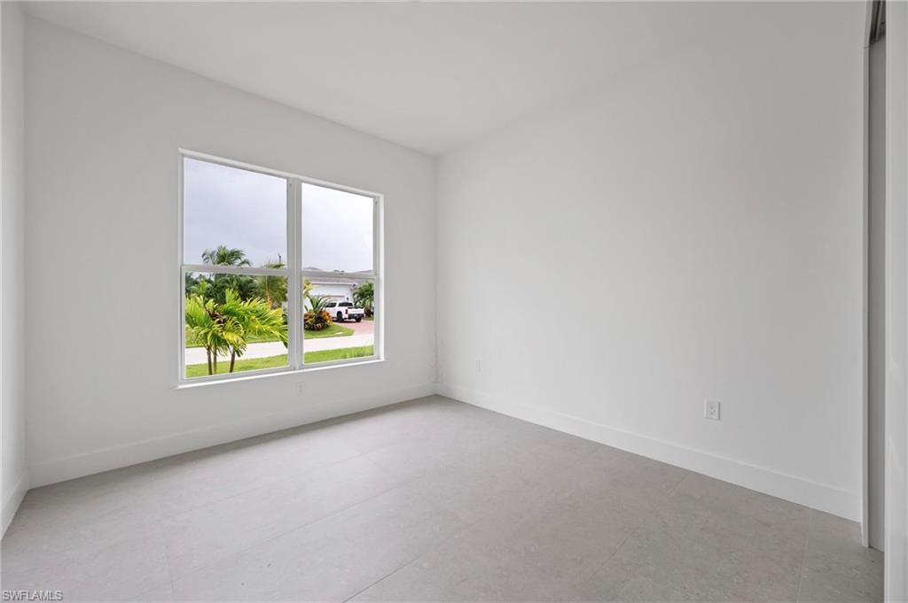 Spare room with baseboards