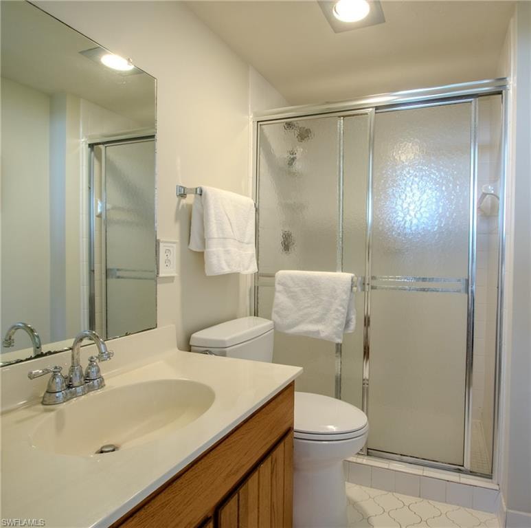 Full bathroom with walk in shower.