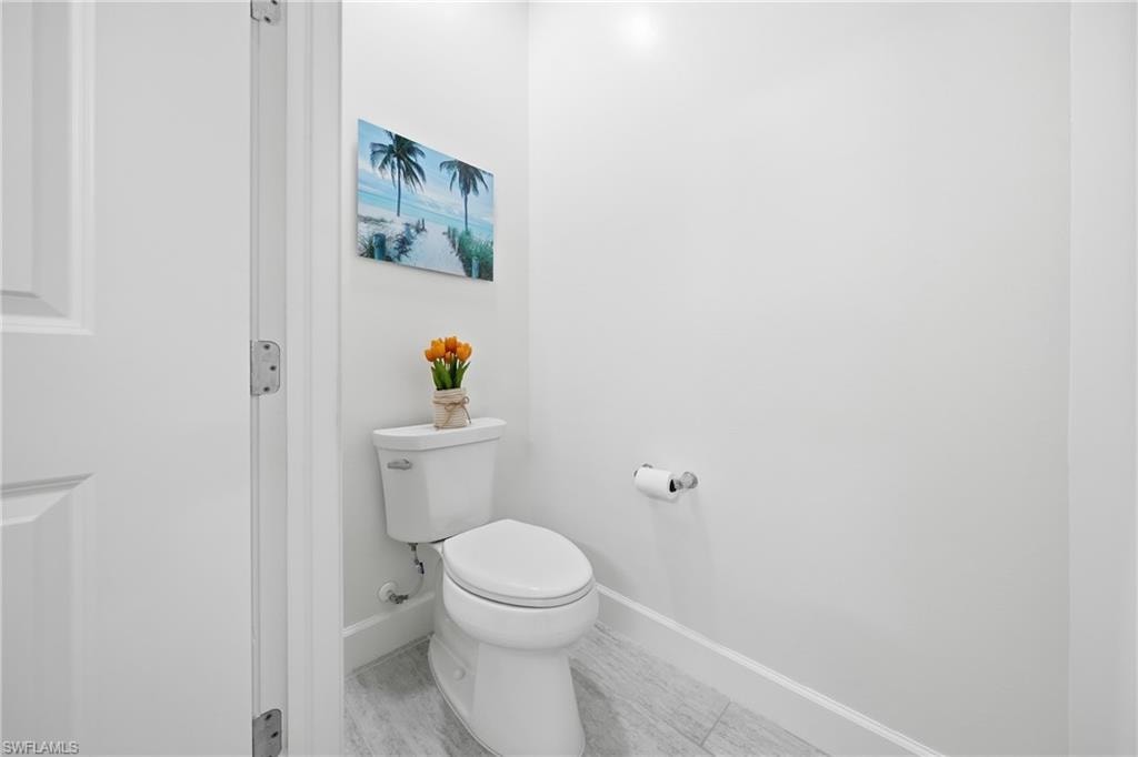 Primary bathroom featuring dual vanities, fresh paint, updated lighting, and a clean, well-maintained layout designed for everyday comfort.