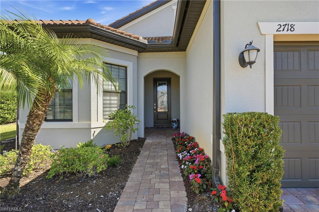 Welcoming entry with clean architectural lines and updated curb appeal