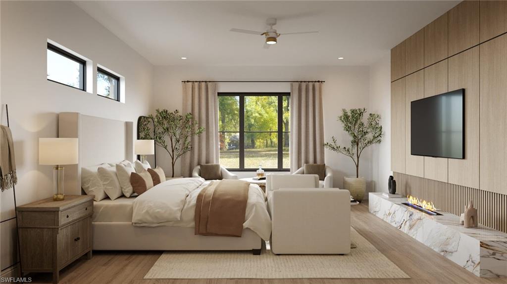 Photos are of a similar home by builder and are for illustrative purposes only. Bedroom featuring a ceiling fan, light wood-style flooring, and recessed lighting.