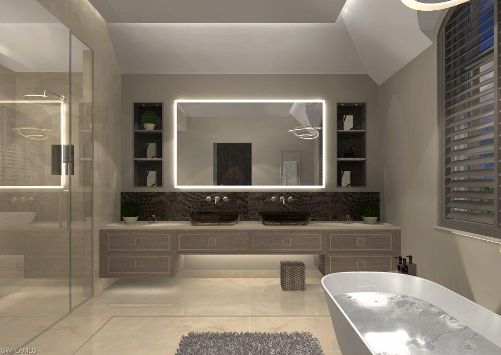Photos are of a similar home by builder and are for illustrative purposes only. Bathroom featuring double vanity, a shower stall, decorative backsplash, and a freestanding tub.
