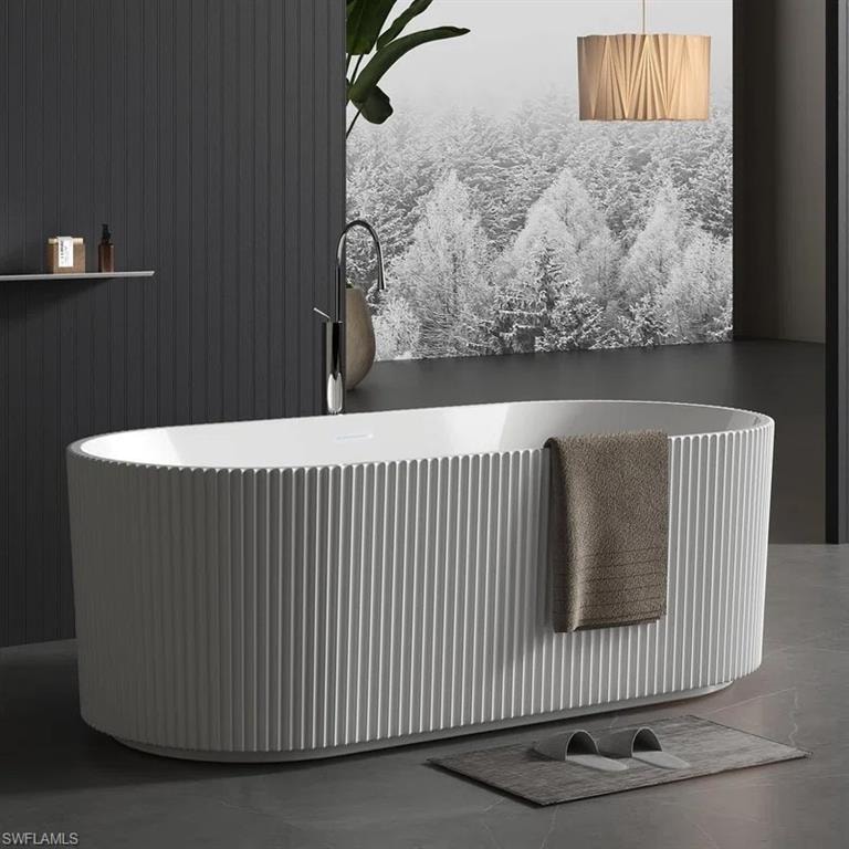 Photos are of a similar home by builder and are for illustrative purposes only. Optional fluted tub can be selected as part of your customized finishes.