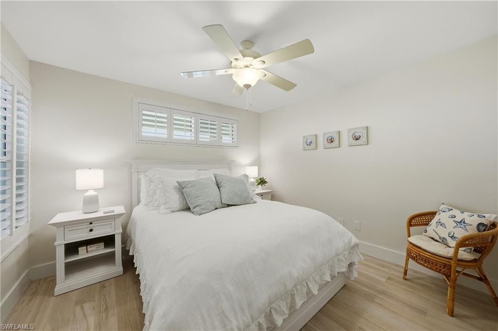 2nd Bed with Plantation Shutters, Tile Flooring, and Ceiling Fan