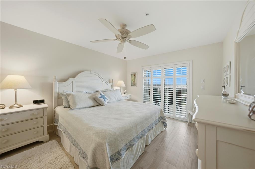 Primary Bedroom with Plantation Shutters, Tile Flooring and Ceiling Fan, Dual Closets
