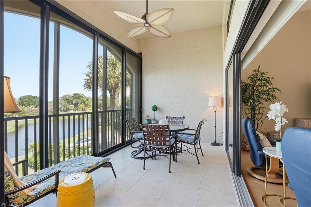 Covered Balcony featuring a water view