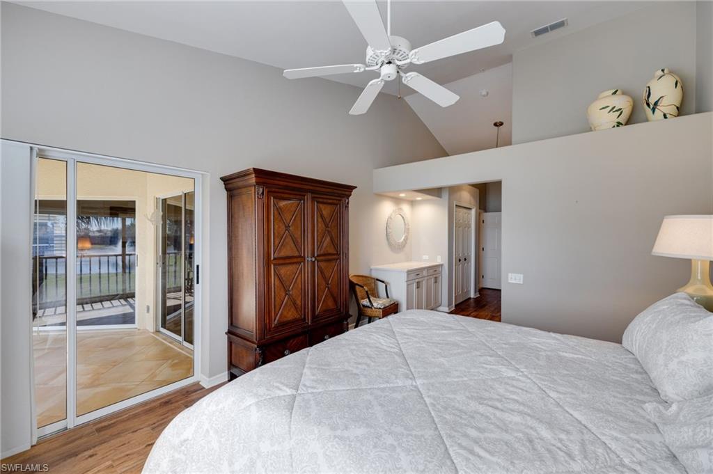 Primary bedroom with access to the screened balcony