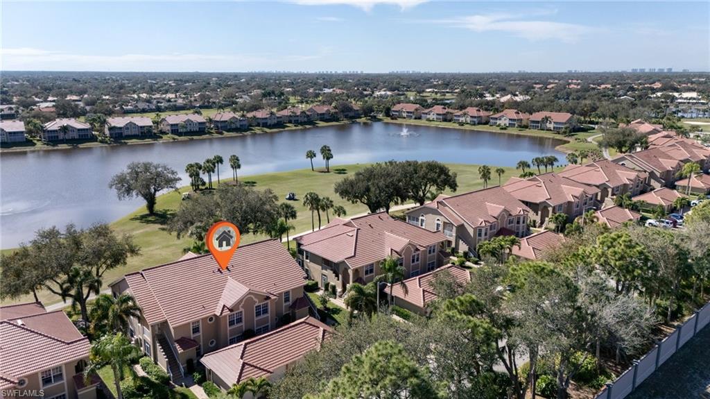 Aerial perspective of building location on golf course and lake