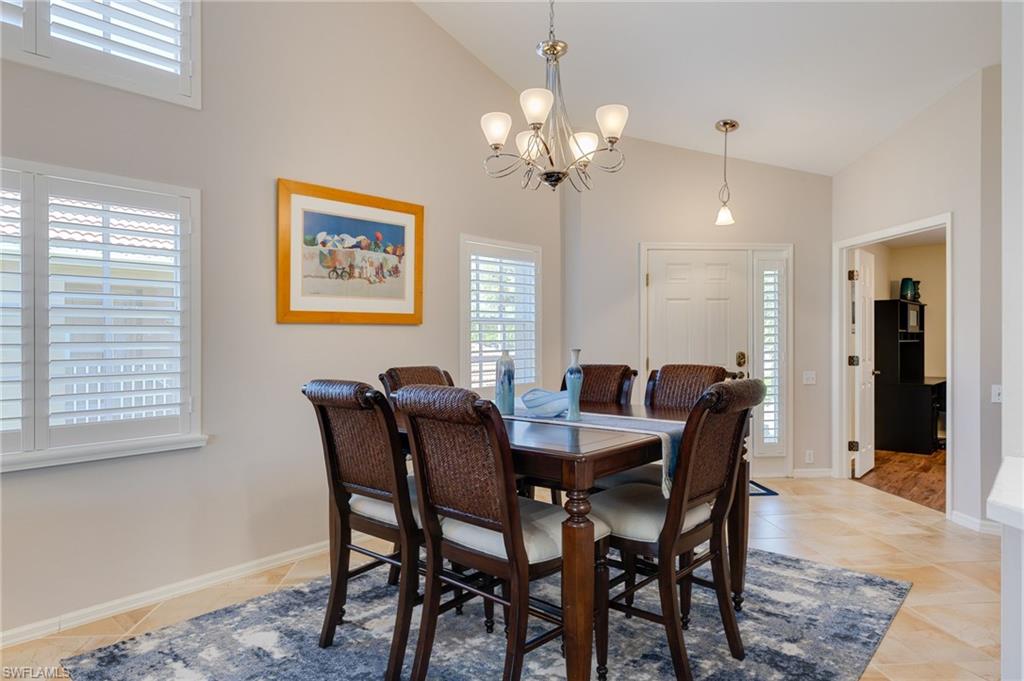 Additional dining space with vaulted ceiling and healthy amount of natural light!