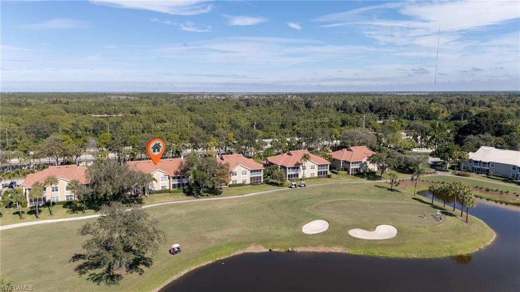 Aerial of the back of the building, course and lake
