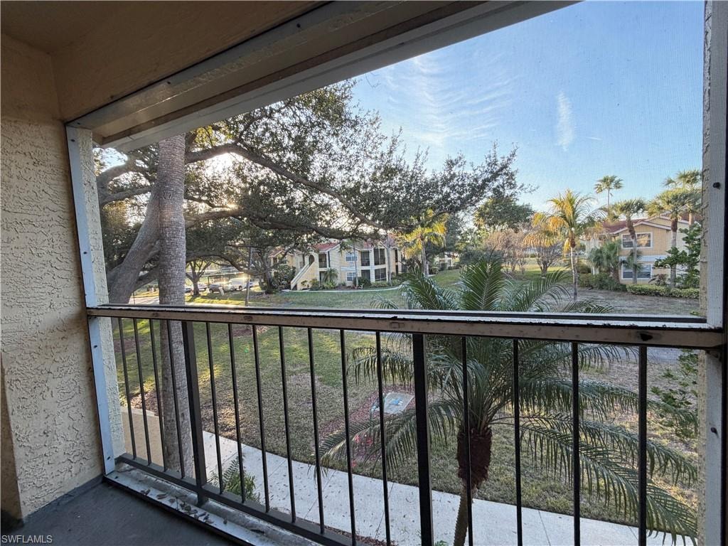 Balcony featuring a residential view