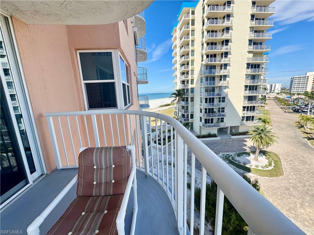 Balcony featuring a beach view