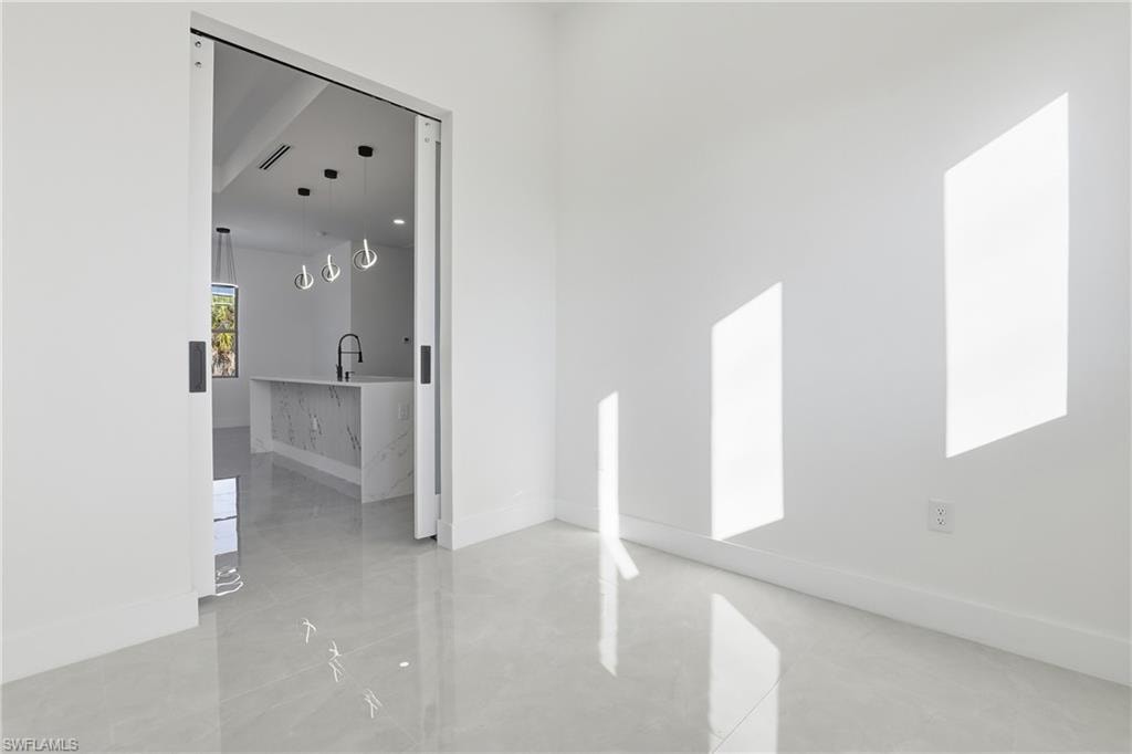 Empty room with baseboards