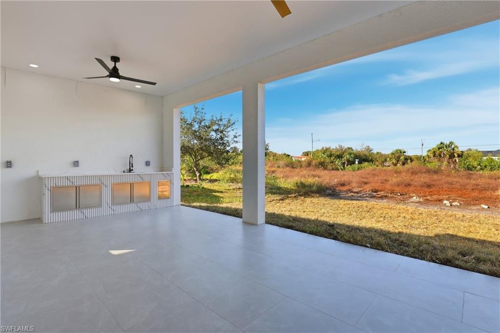 View of patio / terrace featuring ceiling fan