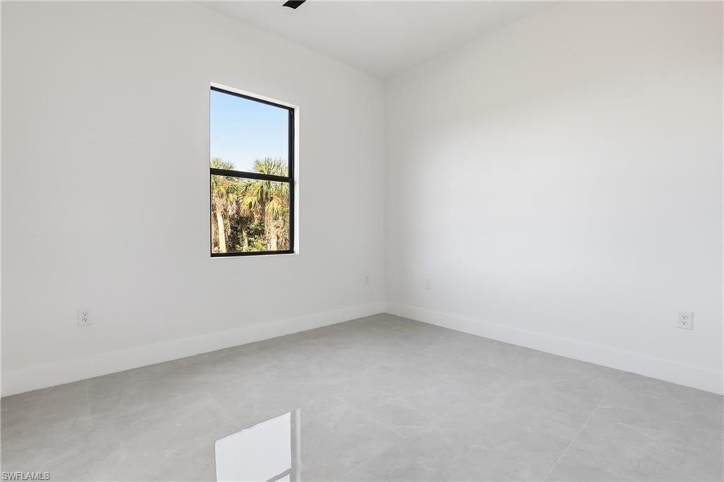 Spare room with baseboards