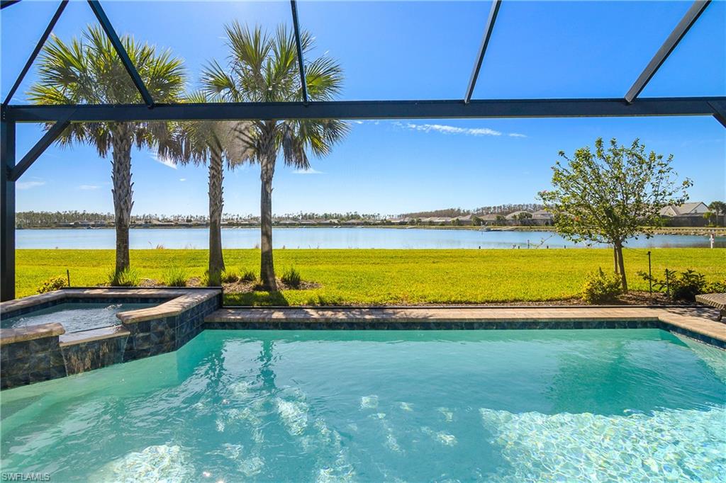 Welcome to this LAKEFRONT, meticulously kept, stunning Summerwood home located at 19165 Aqua Shore Dr.