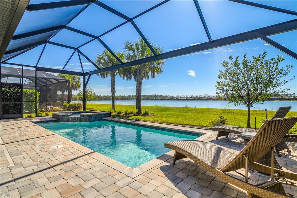 Enjoy your private pool and spa with picture frame lanai screen providing unobstructed lake views with coveted southern exposure.