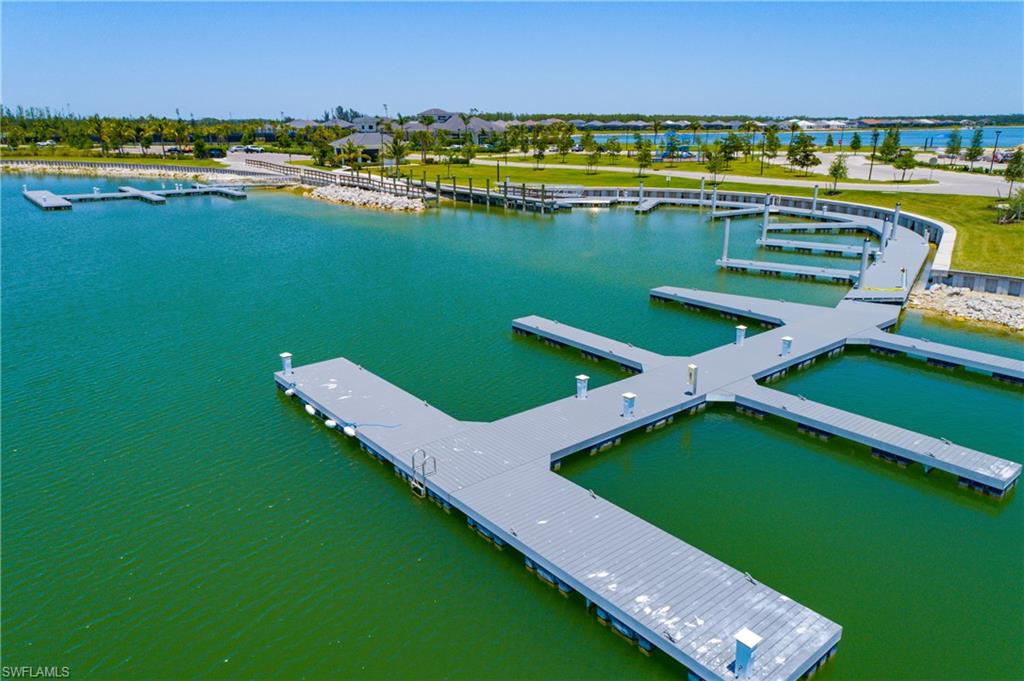 Add your own dock to this home on Aqua Shore, or lease a boat slip at the marina.