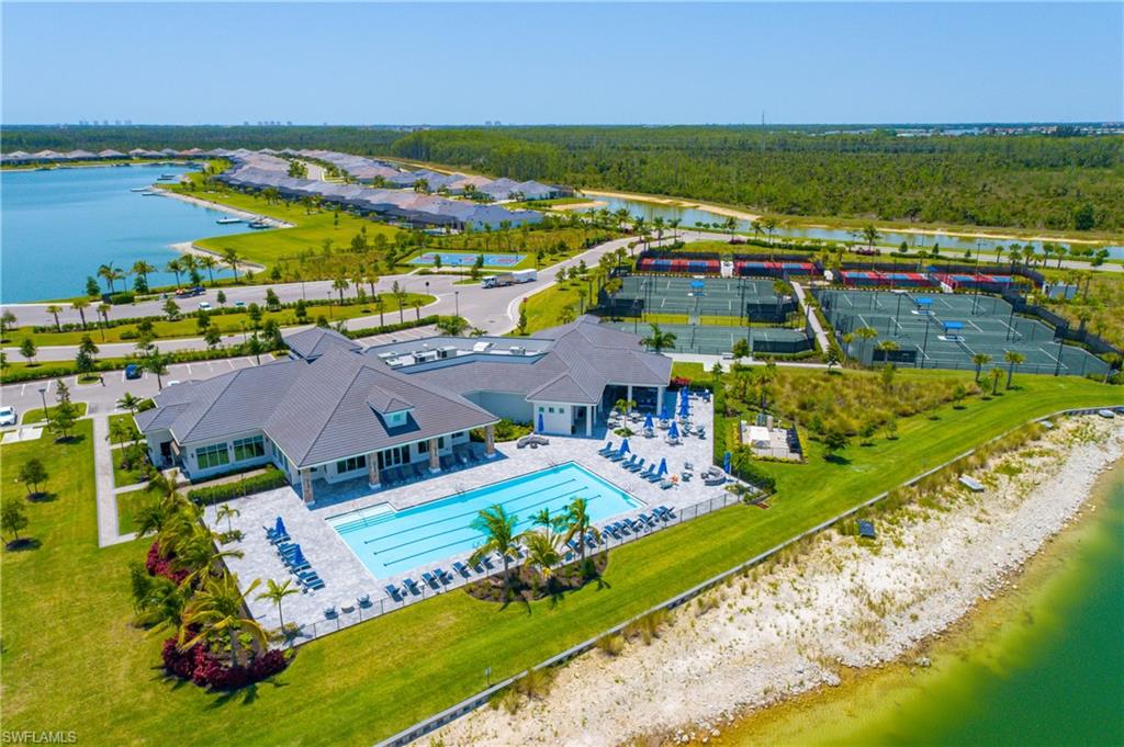 The sports club includes a lap pool, attended state-of-the-art fitness center, an exercise and spin room, his and her saunas, and an onsite spa.
