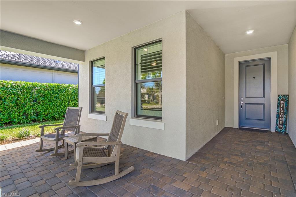 Home features the highest upgraded elevation featuring a charming front porch and covered area.
