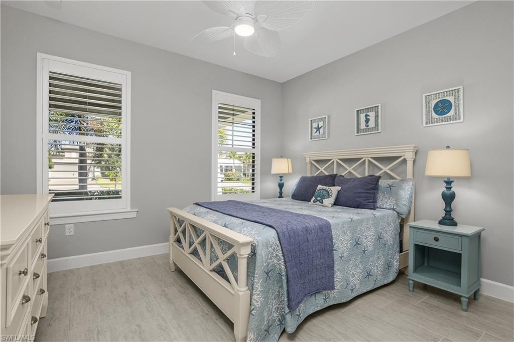 The split bedroom floorplan features the guest bedroom at the front of the home with nearby guest bath.