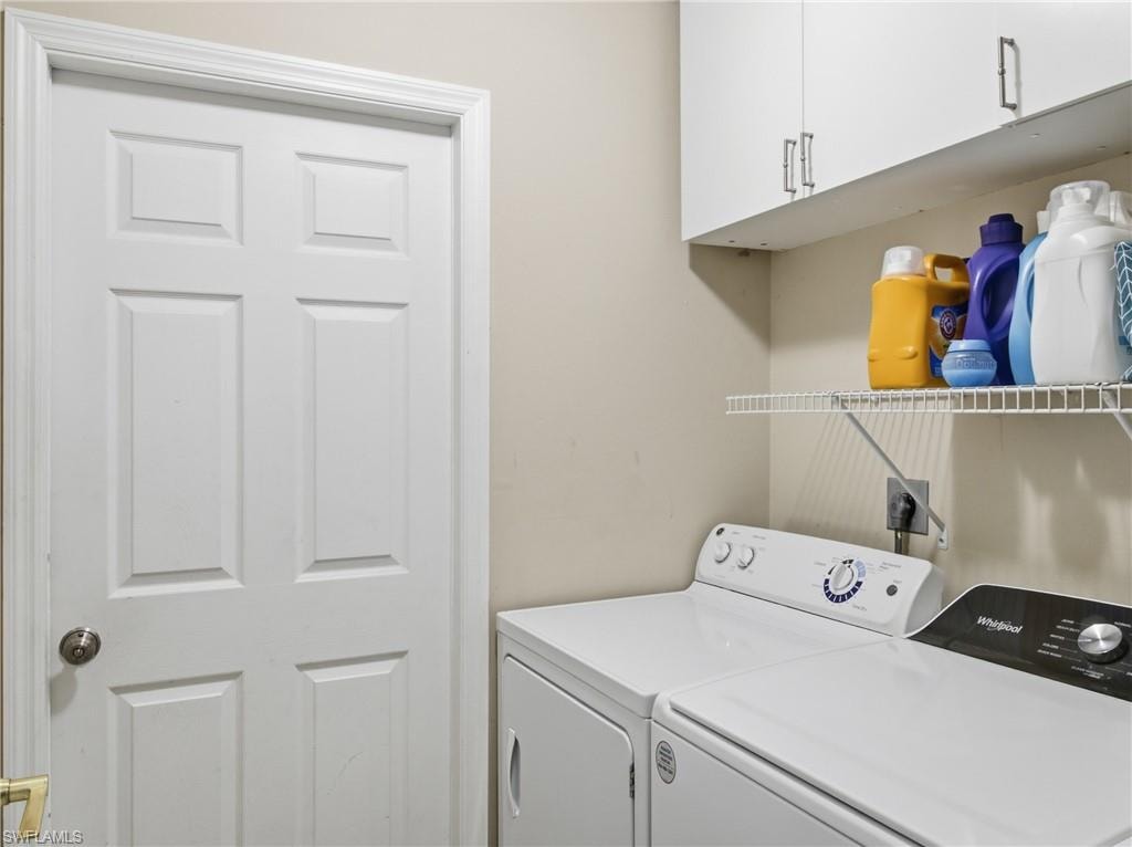 Laundry room with washer, dryer and cabinet space