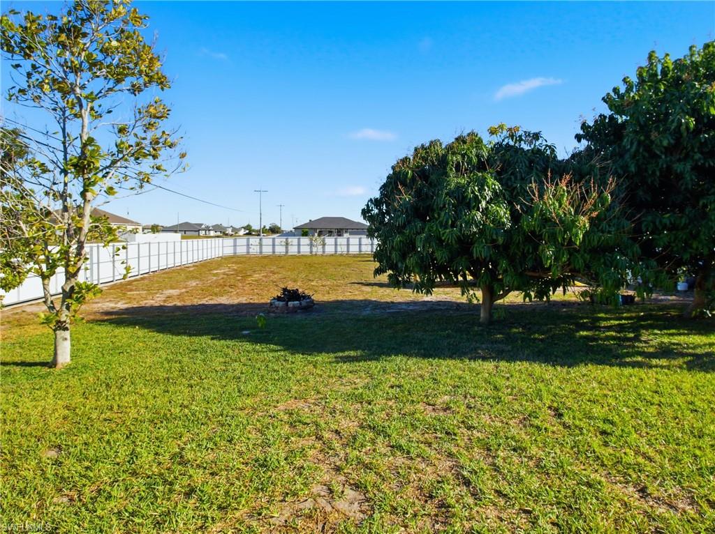 View of yard and fence