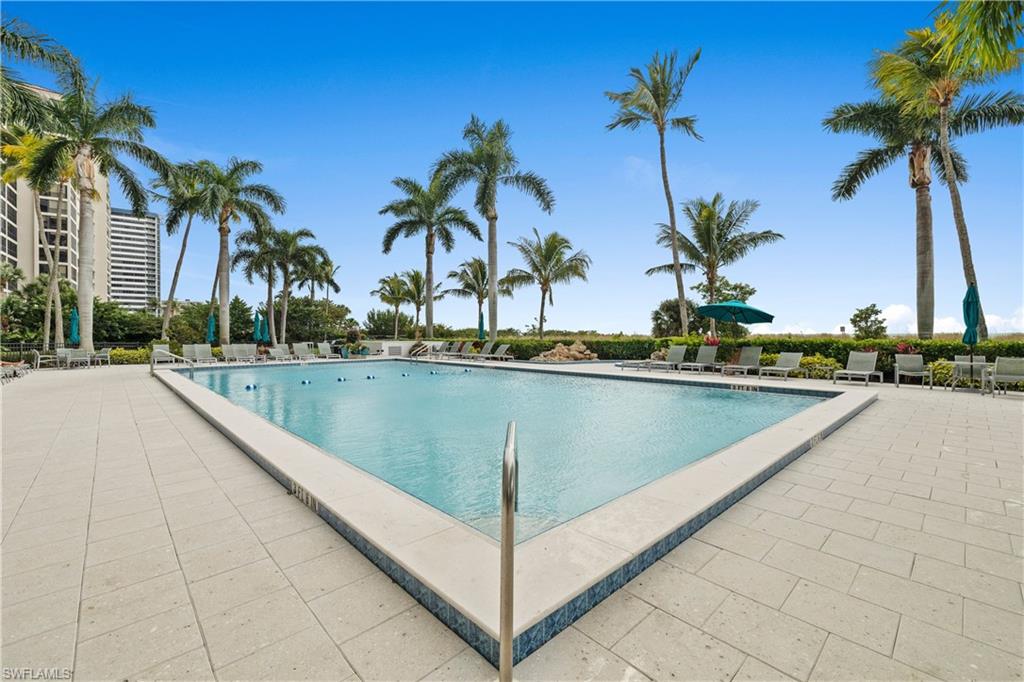 Community pool with a patio area
