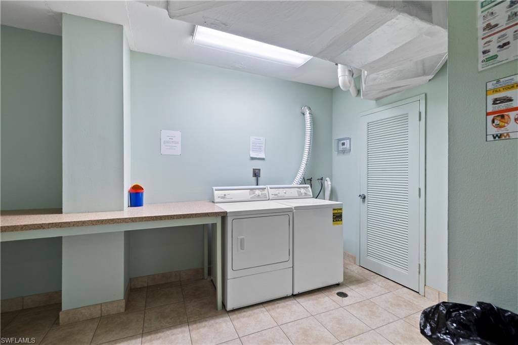 Laundry area featuring washer and clothes dryer
