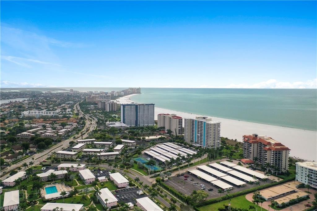 View of urban area with expansive beach