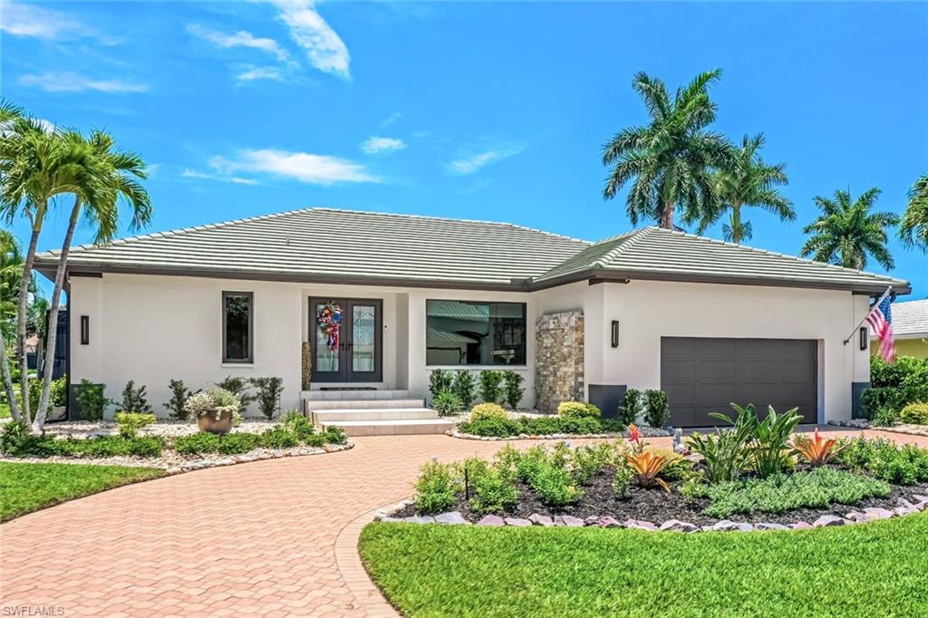 View of front of home featuring a waterfall.