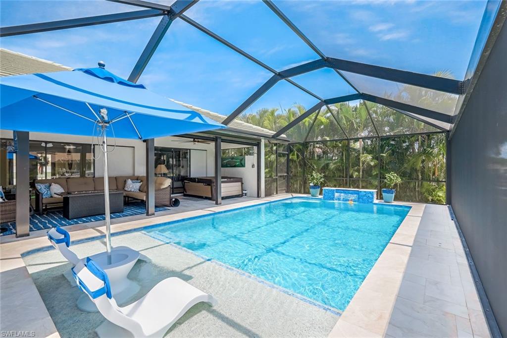 In-pool loungers and waterfall feature provide the ultimate oasis and such privacy as well.