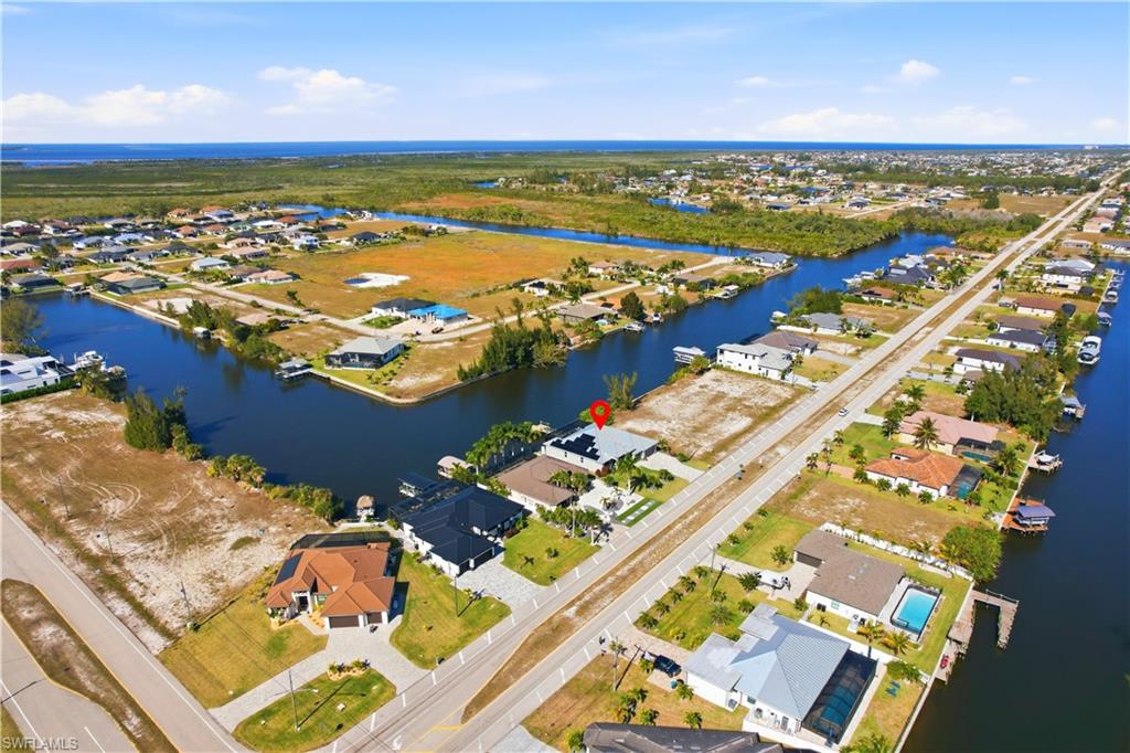 Aerial view of property and surrounding area.  If you were a bird, you could see Boca Grande from here.