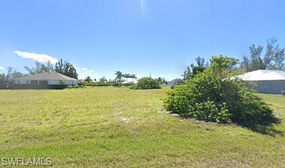 View of grassy yard featuring a view of countryside