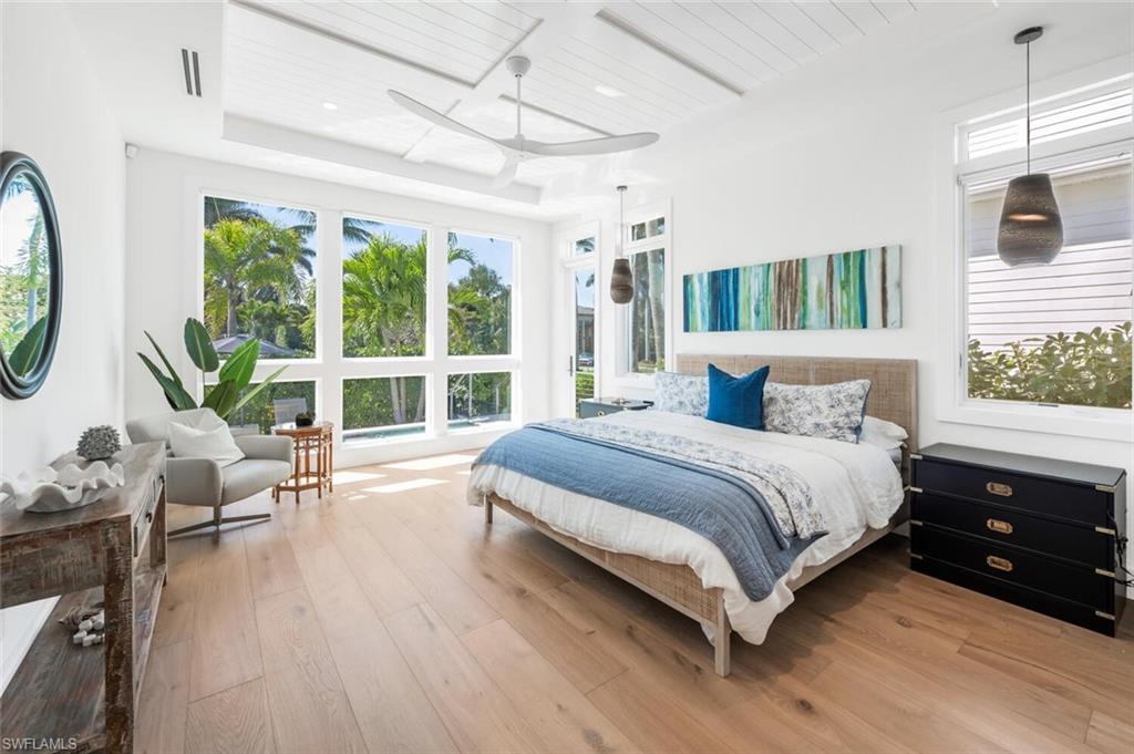 Primary Bedroom/King-Sized Bed